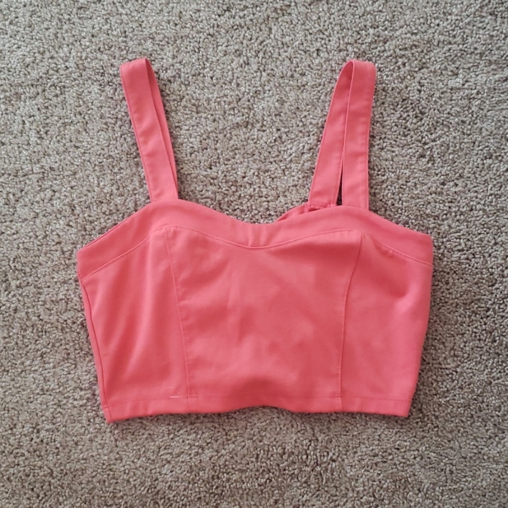 Crop top with bows in the back.